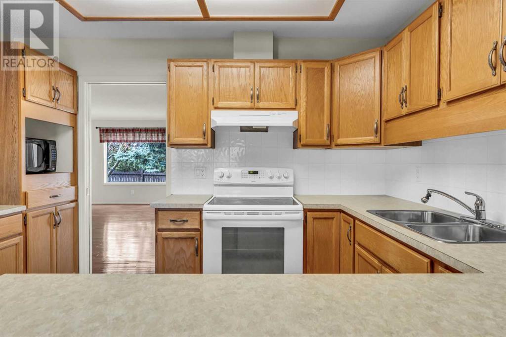 Single Family House for Sale in  Coach Side Terrace SW Coach Hill Calgary 