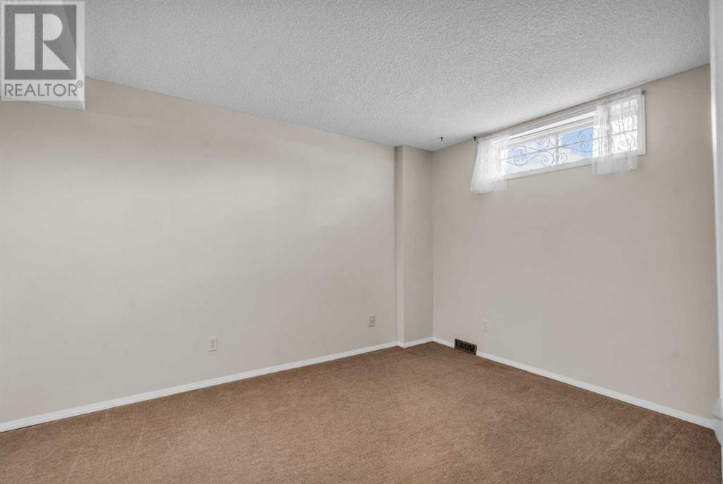 Single Family House for Sale in  Coach Side Terrace SW Coach Hill Calgary 