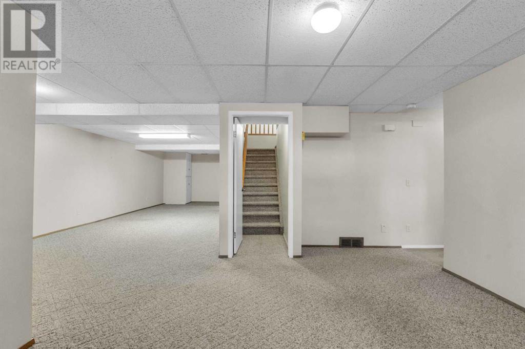 Single Family House for Sale in  Coach Side Terrace SW Coach Hill Calgary 