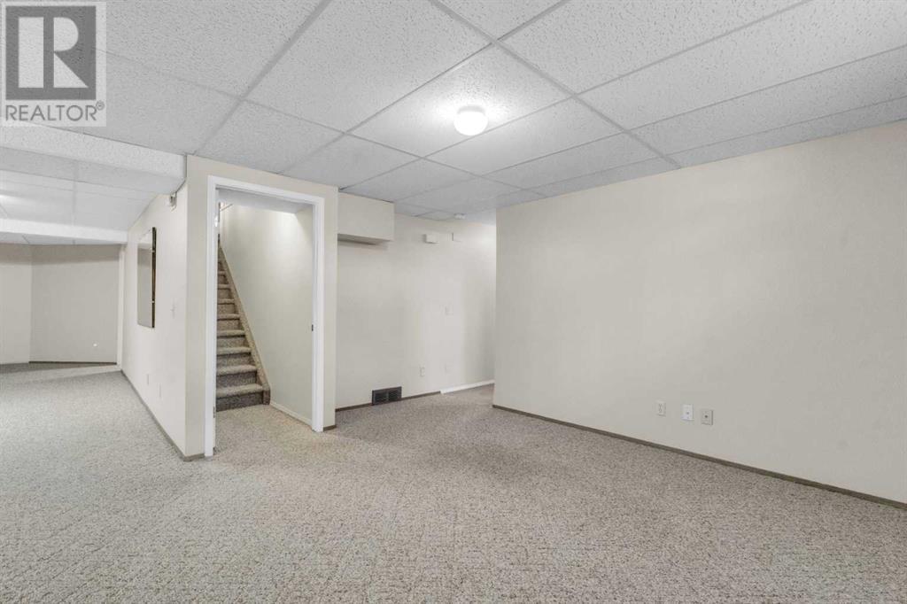 Single Family House for Sale in  Coach Side Terrace SW Coach Hill Calgary 