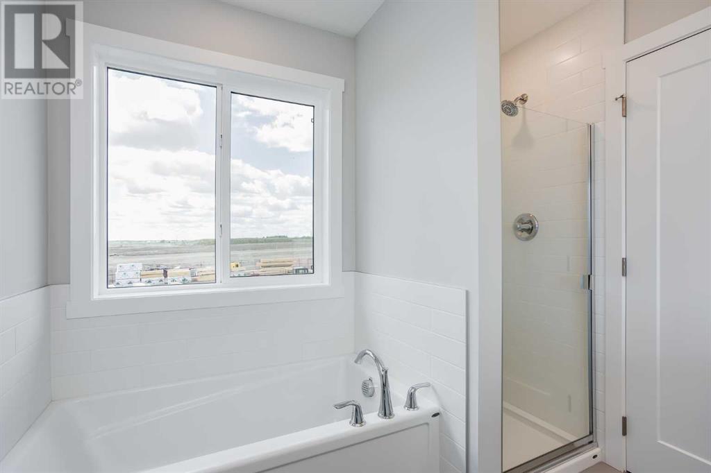 Photo 7 of 461 South Point Glen Sw, Airdrie AB