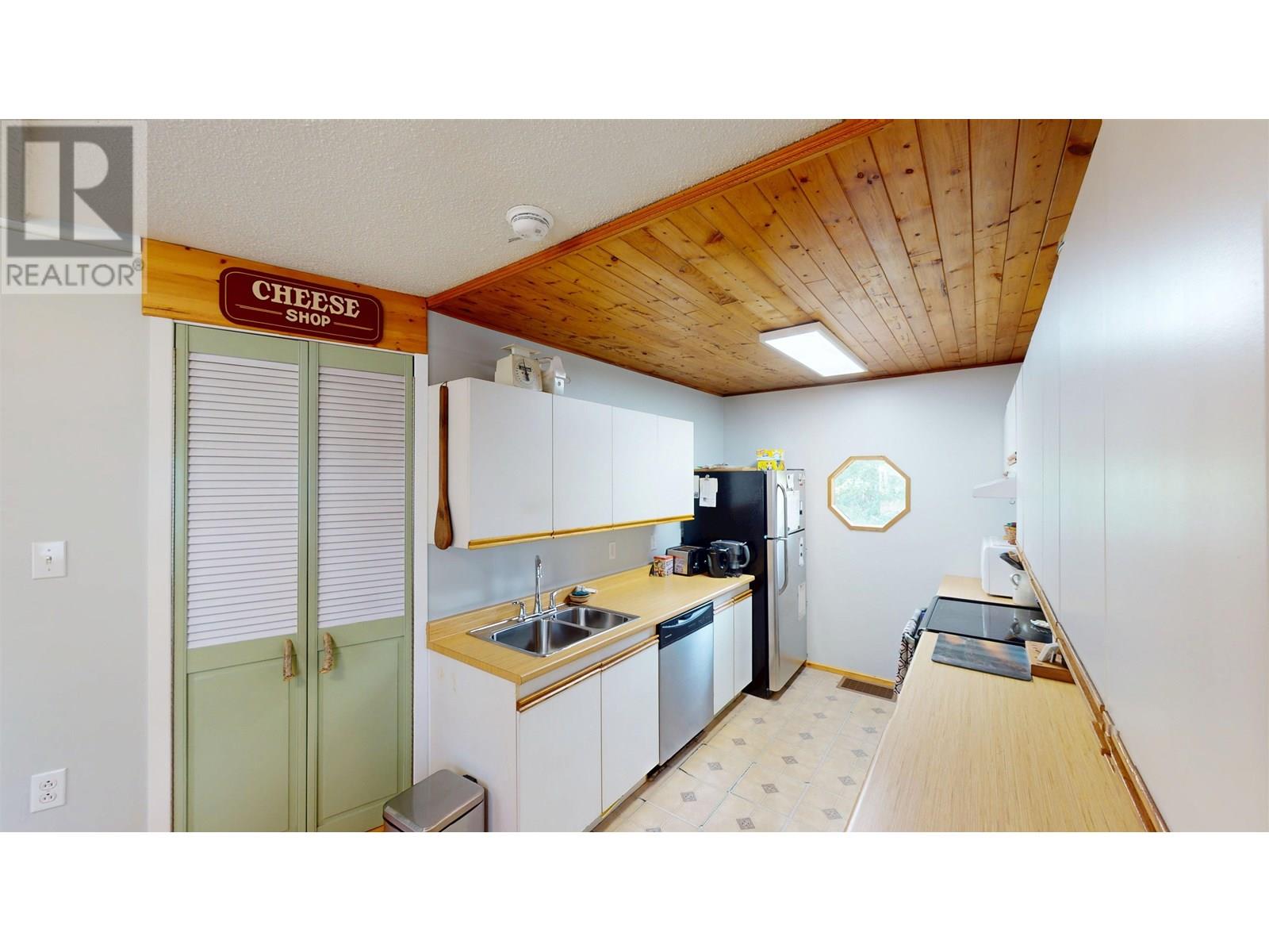 Photo 8 of 10719 Dr Greene Street, Hudsons Hope BC