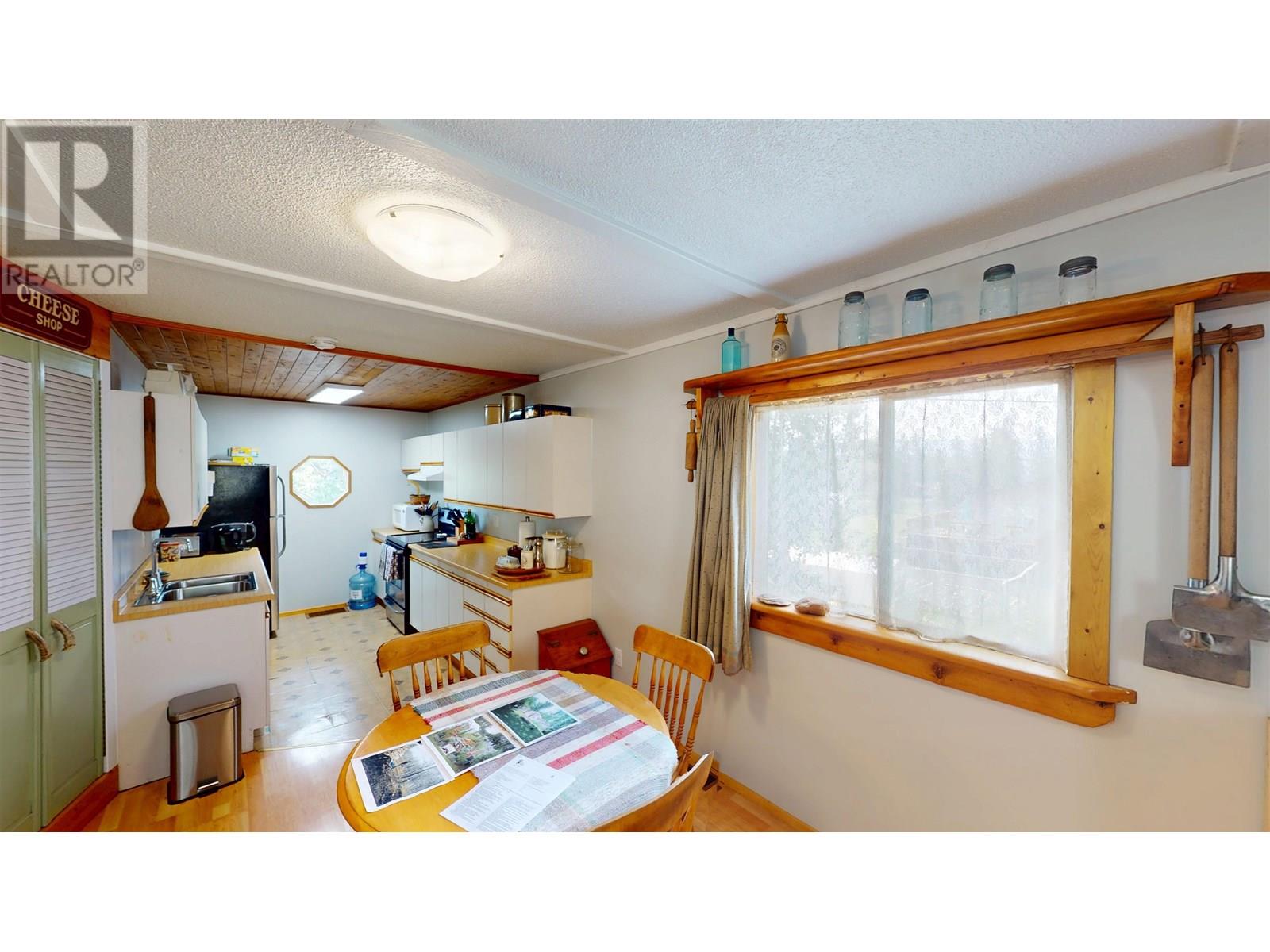 Photo 9 of 10719 Dr Greene Street, Hudsons Hope BC