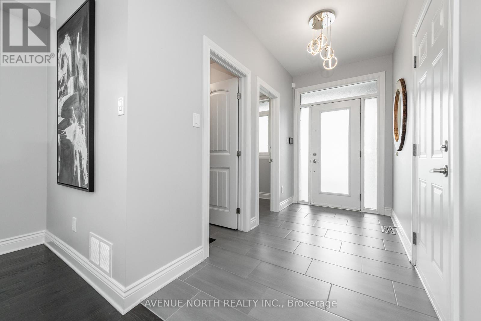 Large foyer with walk-in closet for coats