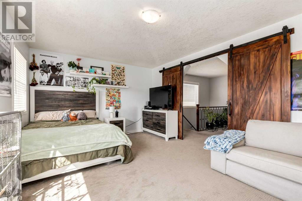 Photo 11 of 163 Cougarstone Court Sw, Calgary AB