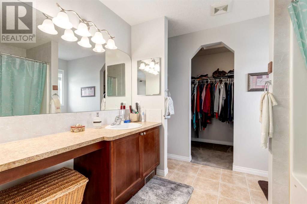 Photo 23 of 163 Cougarstone Court Sw, Calgary AB