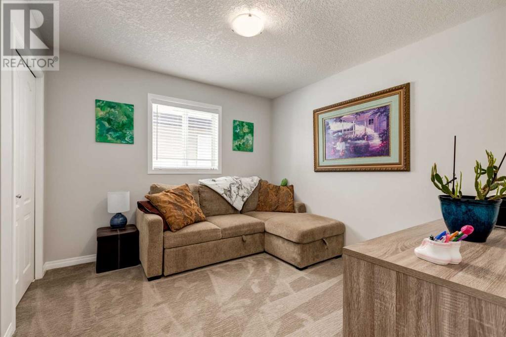 Photo 12 of 163 Cougarstone Court Sw, Calgary AB