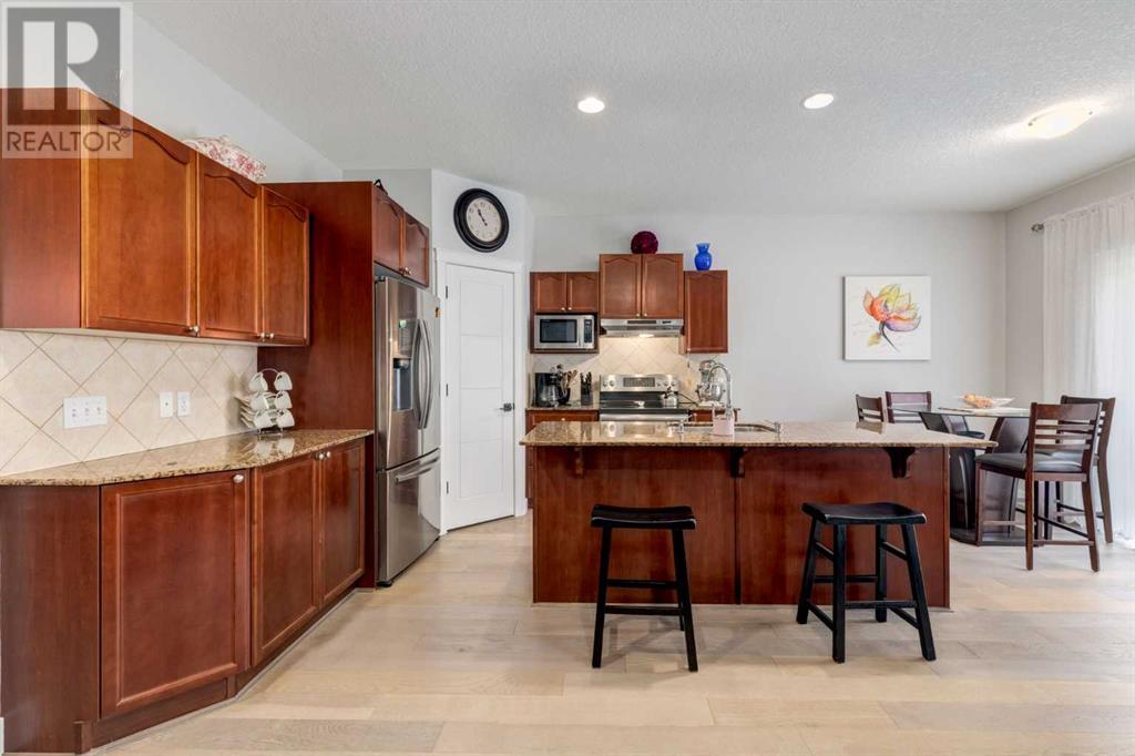 Photo 6 of 163 Cougarstone Court Sw, Calgary AB