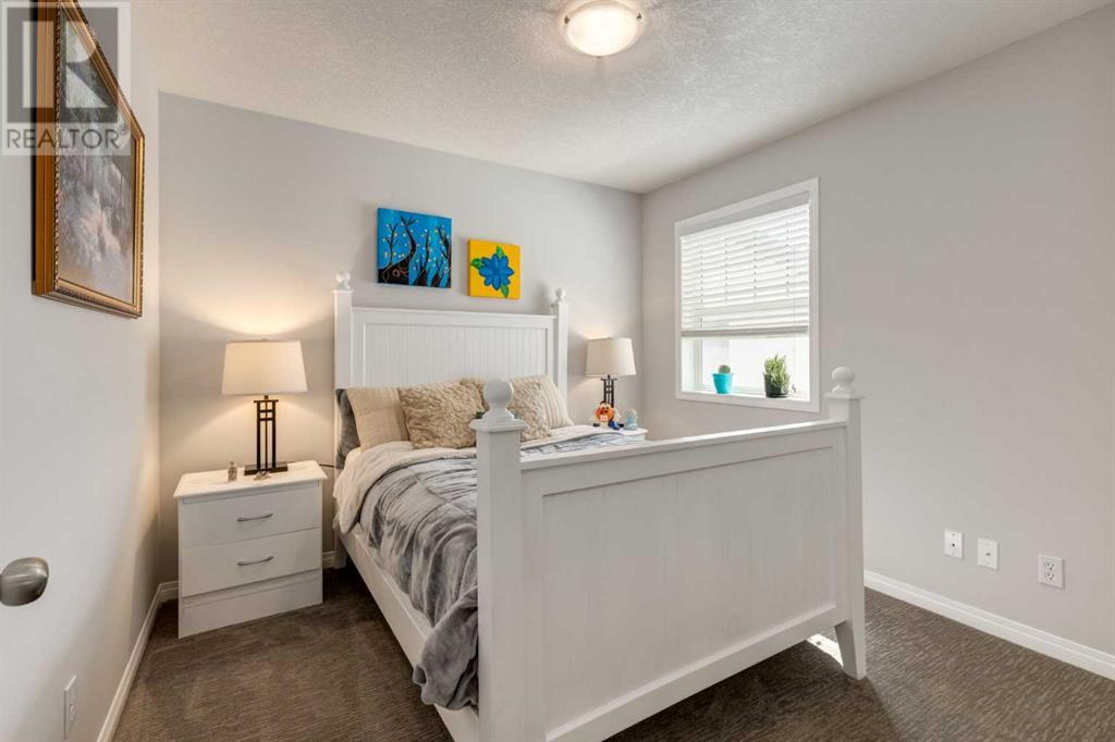 Photo 19 of 163 Cougarstone Court Sw, Calgary AB