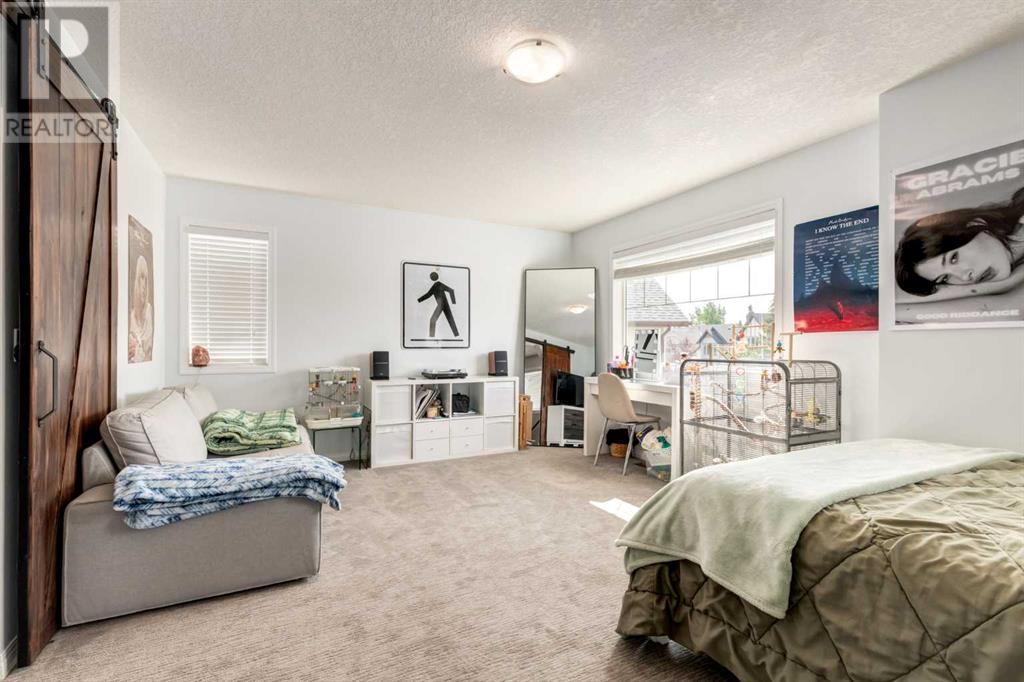 Photo 24 of 163 Cougarstone Court Sw, Calgary AB