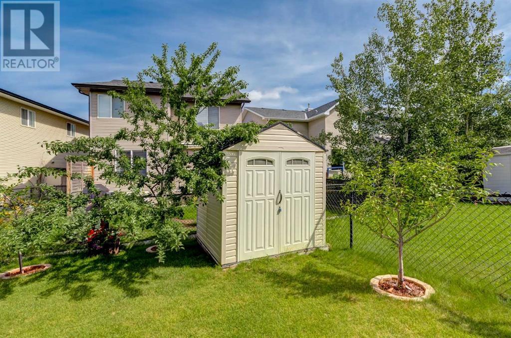 Photo 30 of 163 Cougarstone Court Sw, Calgary AB