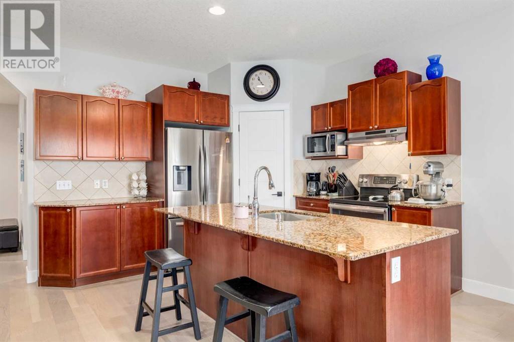 Photo 4 of 163 Cougarstone Court Sw, Calgary AB