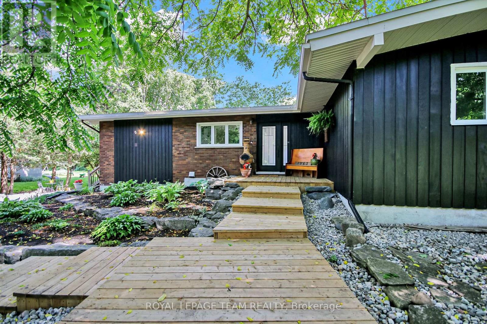 Wood front walkway and porch.