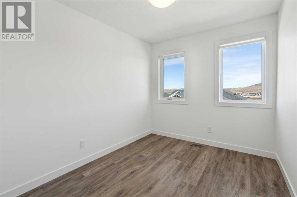 Photo 28 of 502 24 Rivercrest Drive, Cochrane AB