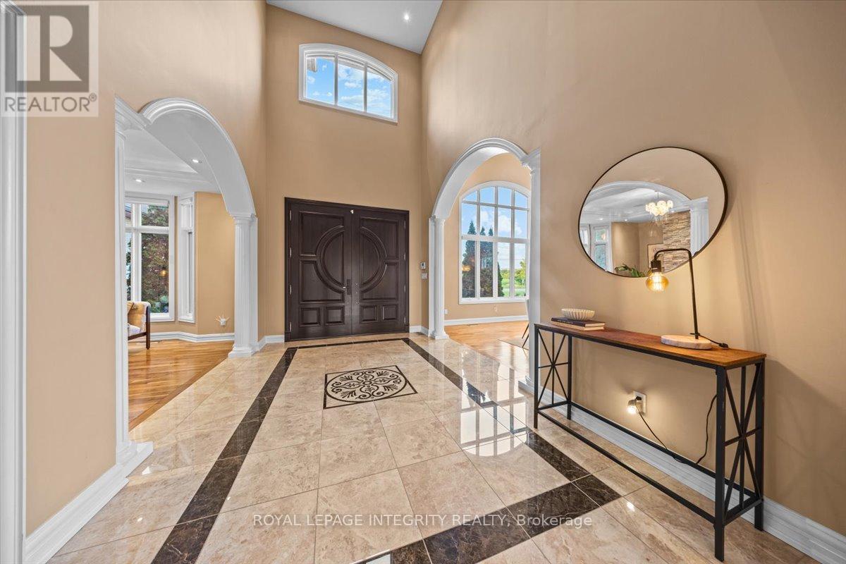 20-foot-high marble-clad foyer