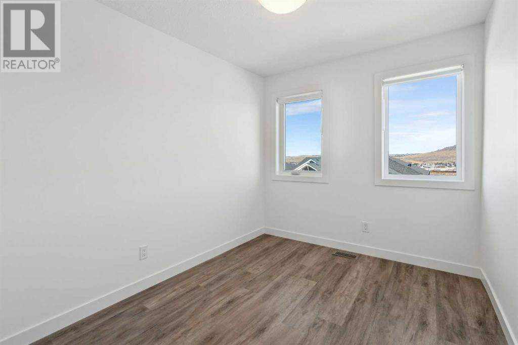 Photo 14 of 103 24 Rivercrest Drive, Cochrane AB