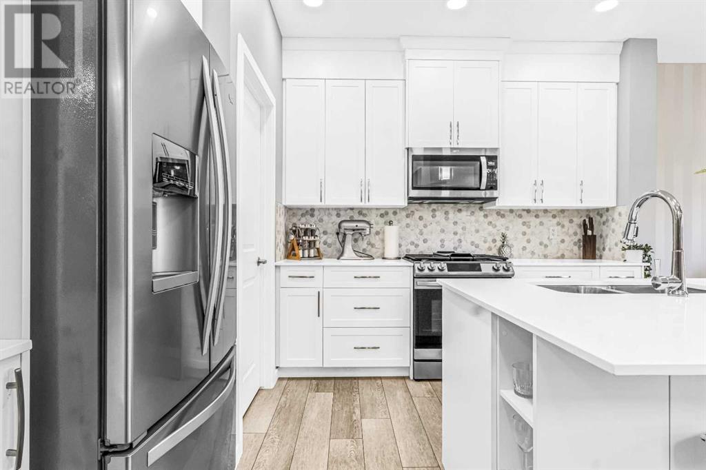 Photo 13 of 1036 Chinook Gate Heath Sw, Airdrie AB