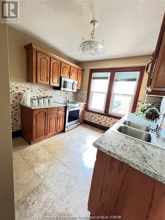 Photo 11 of 1951 Tourangeau Road, Windsor ON