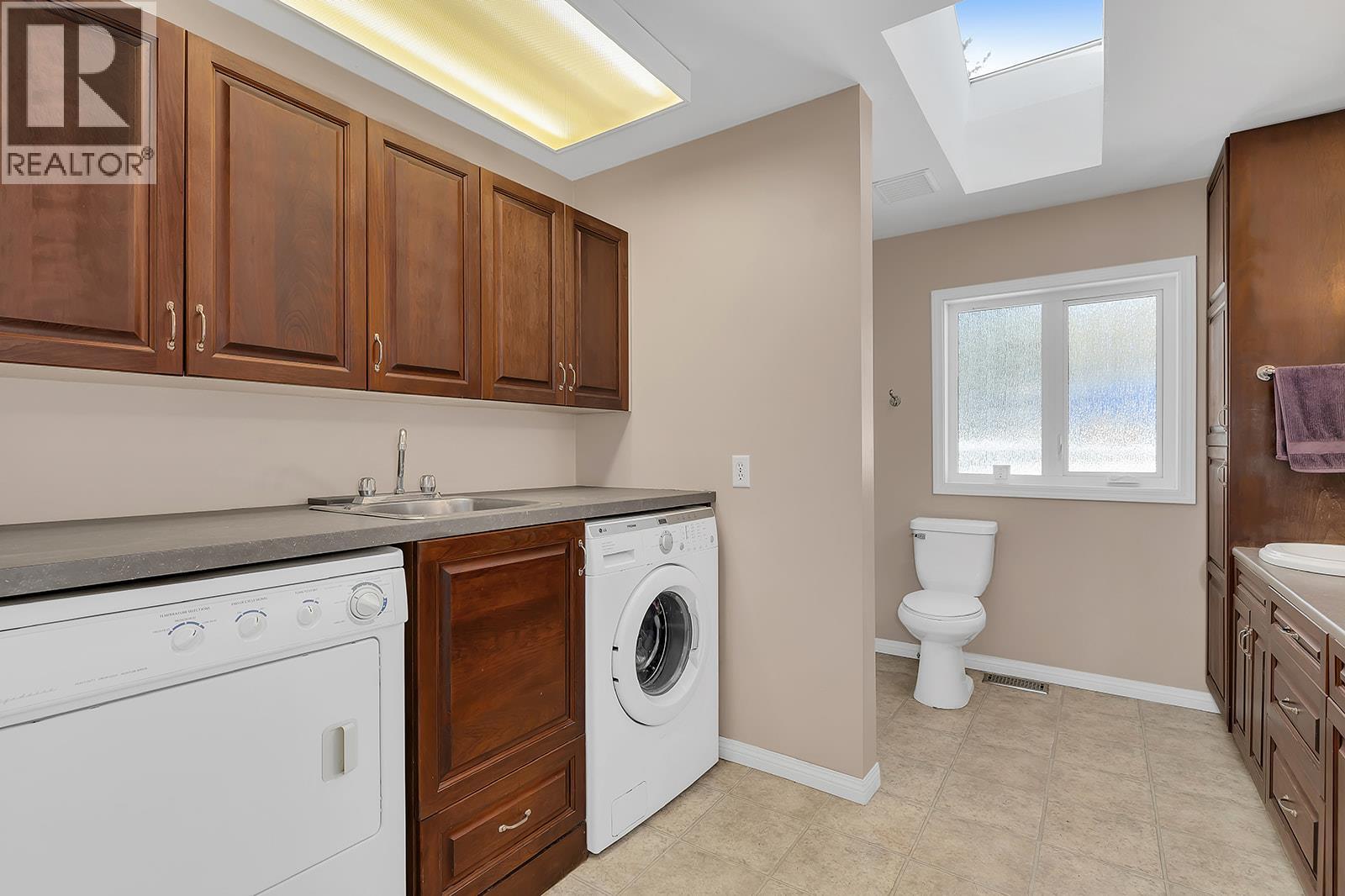 Photo 5 of 7992 Falcon Ridge Crescent, Kelowna BC