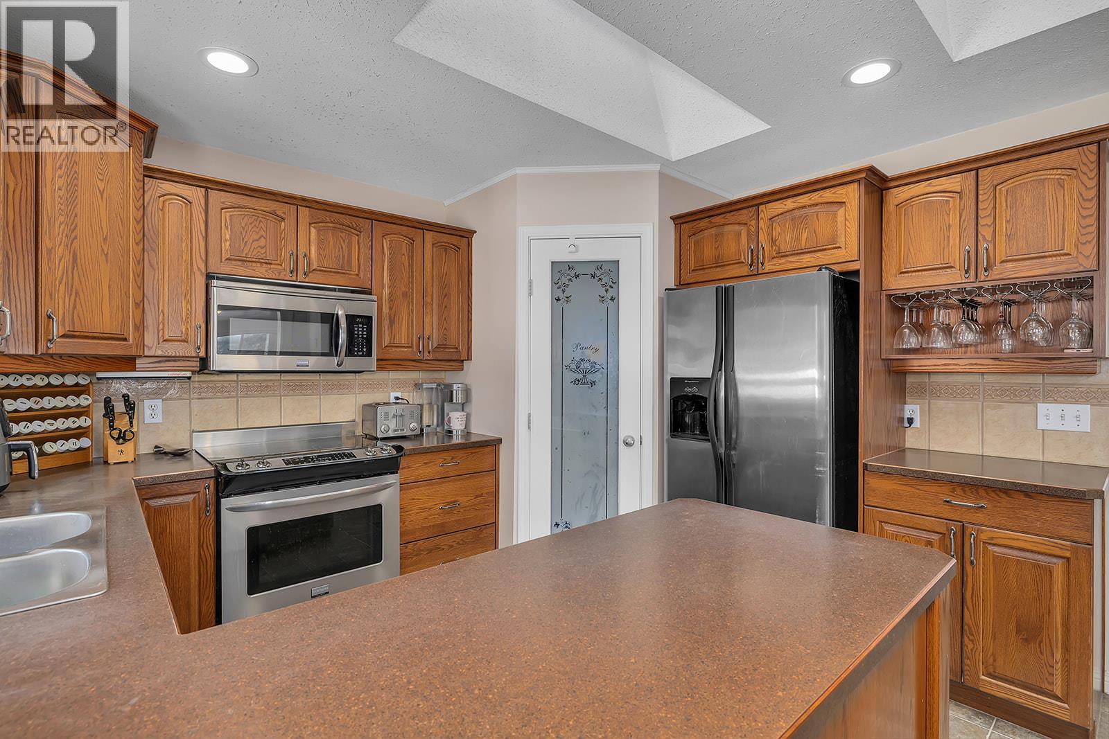 Photo 17 of 7992 Falcon Ridge Crescent, Kelowna BC