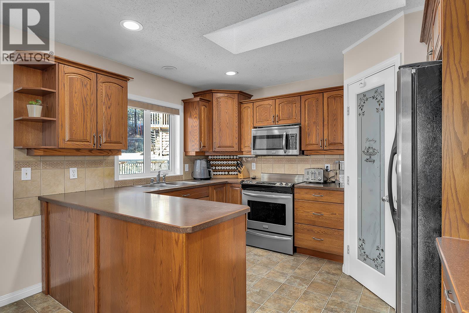 Photo 35 of 7992 Falcon Ridge Crescent, Kelowna BC