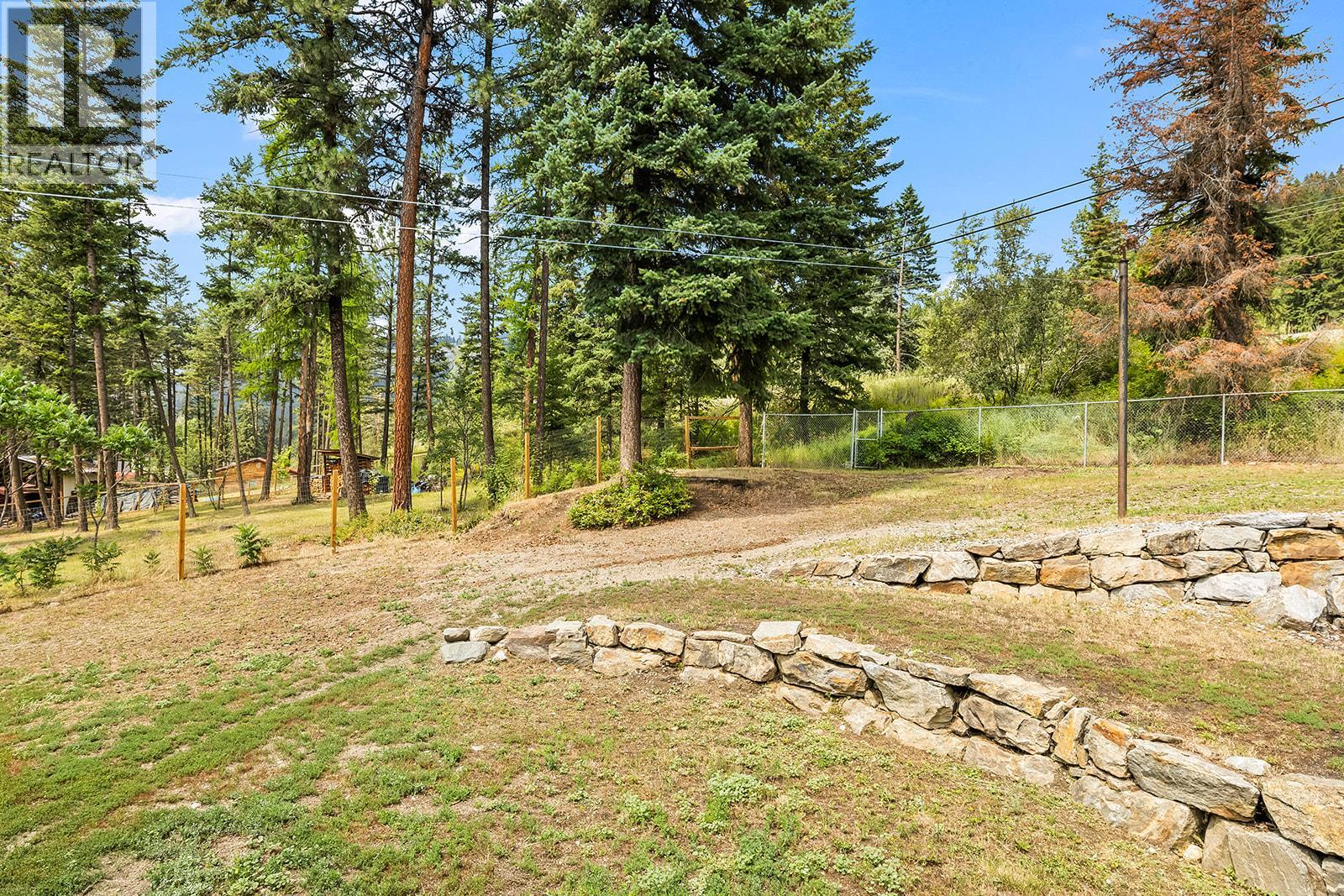 Photo 6 of 7992 Falcon Ridge Crescent, Kelowna BC
