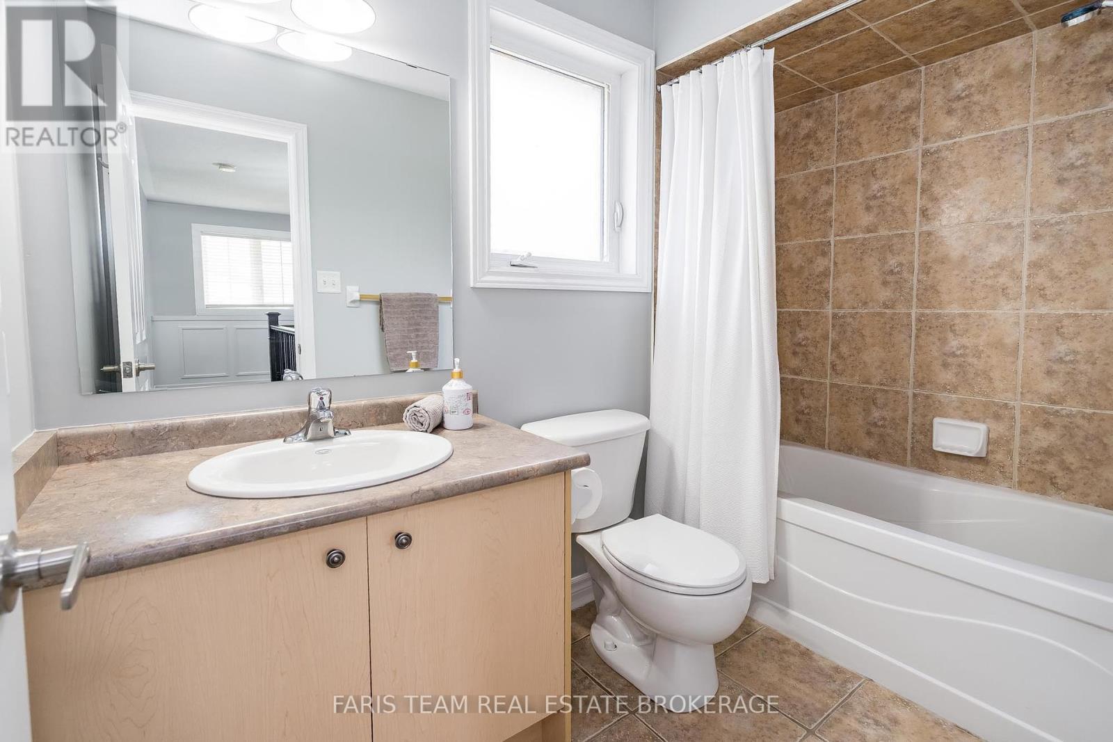 Photo 17 of 18 Mancini Drive, Essa ON