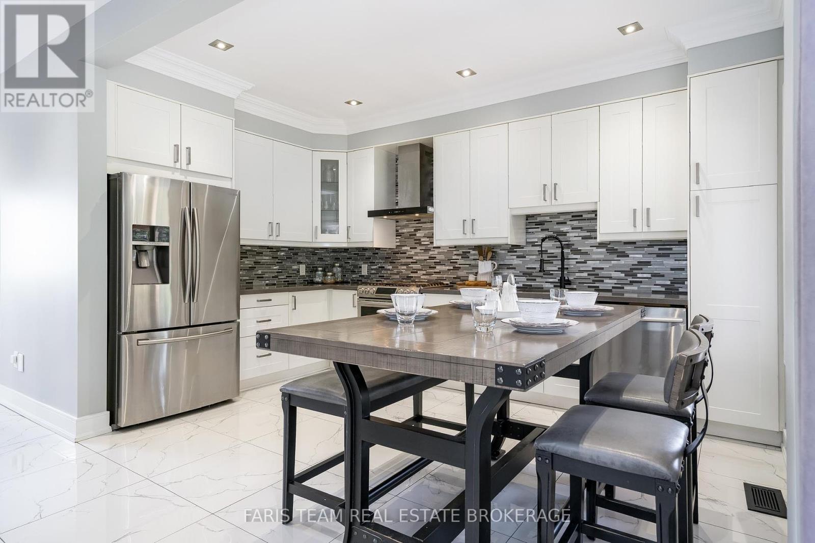 Photo 4 of 18 Mancini Drive, Essa ON