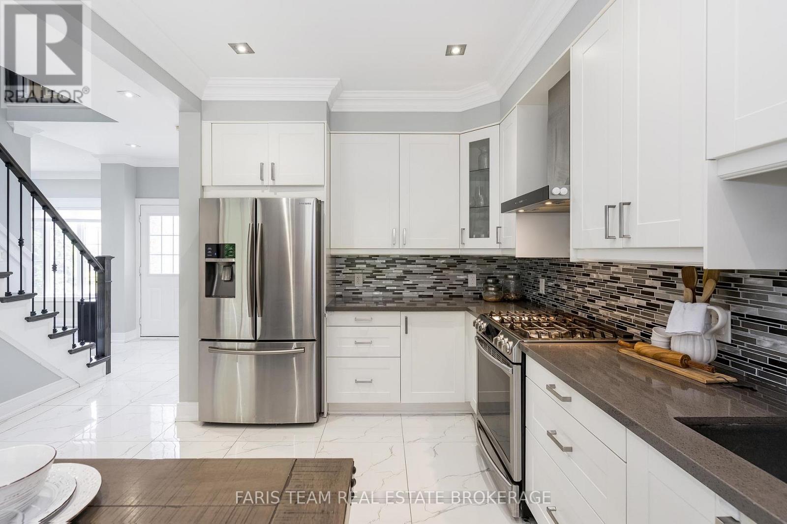 Photo 5 of 18 Mancini Drive, Essa ON