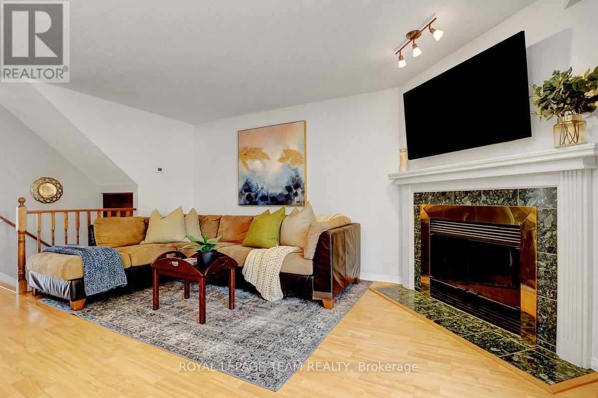 Large Living Area with wood burning fireplace.