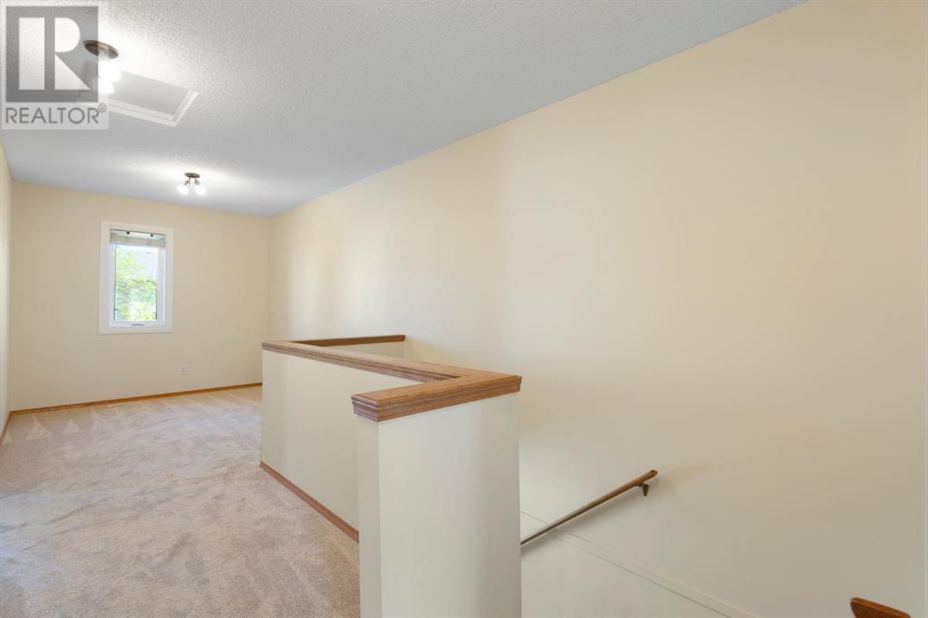 Single Family House for Sale in  Christie Park Mews SW Christie Park Calgary 