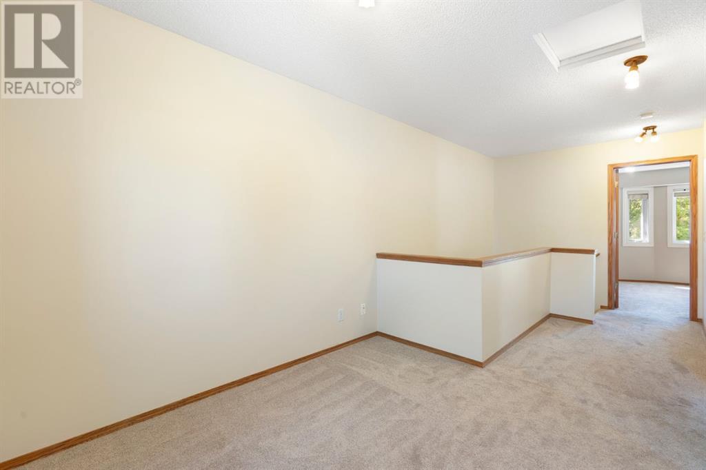 Single Family House for Sale in  Christie Park Mews SW Christie Park Calgary 