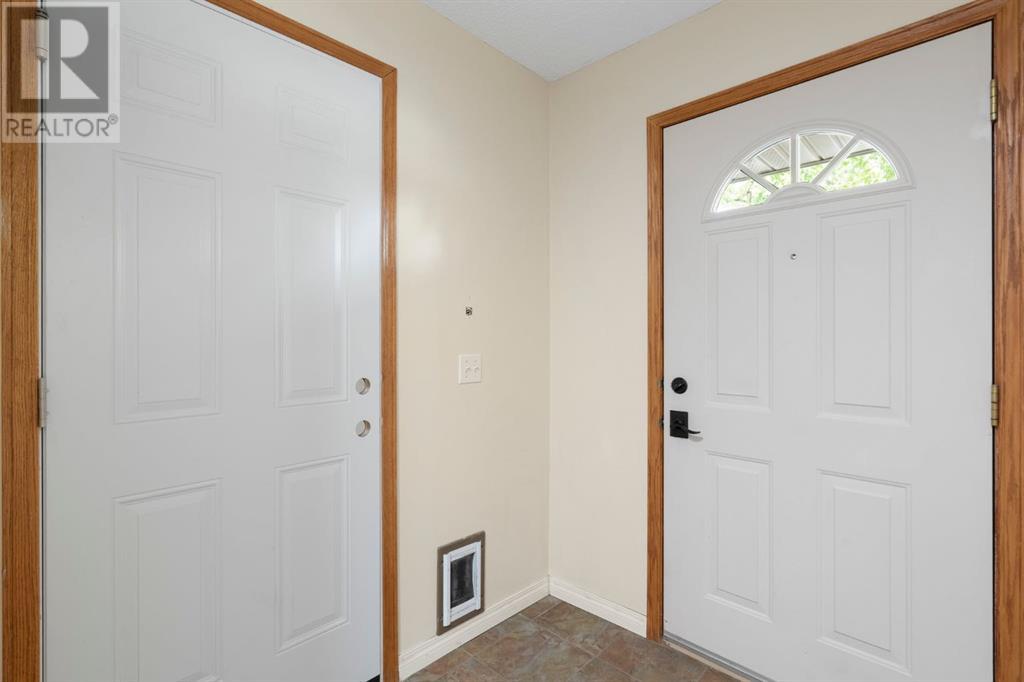 Single Family House for Sale in  Christie Park Mews SW Christie Park Calgary 
