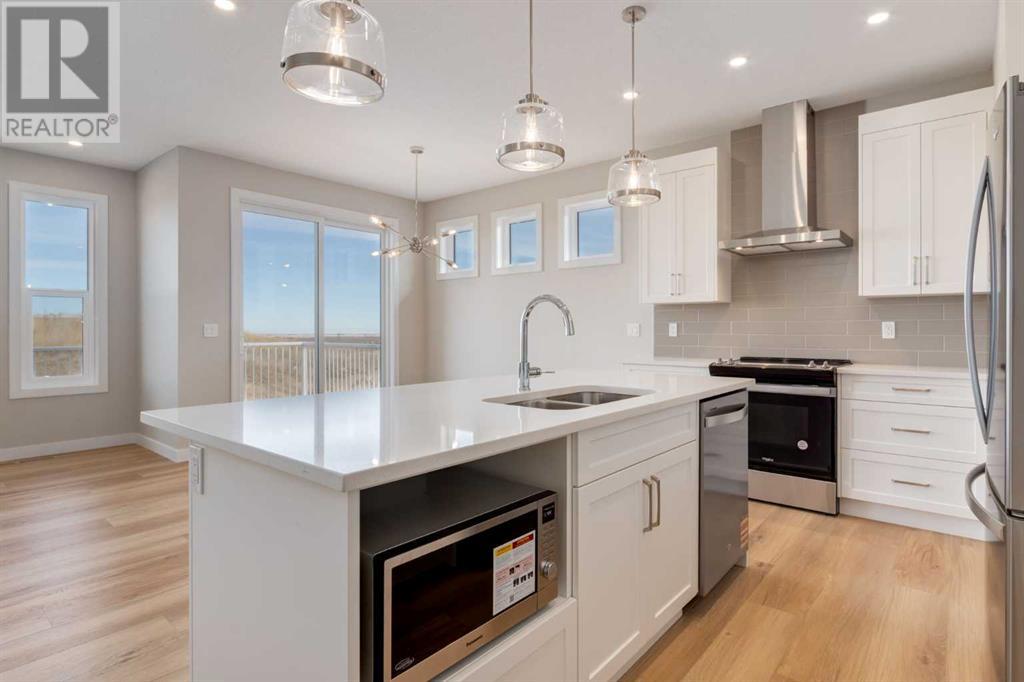 Photo 10 of 1168 Iron Ridge Avenue, Crossfield AB