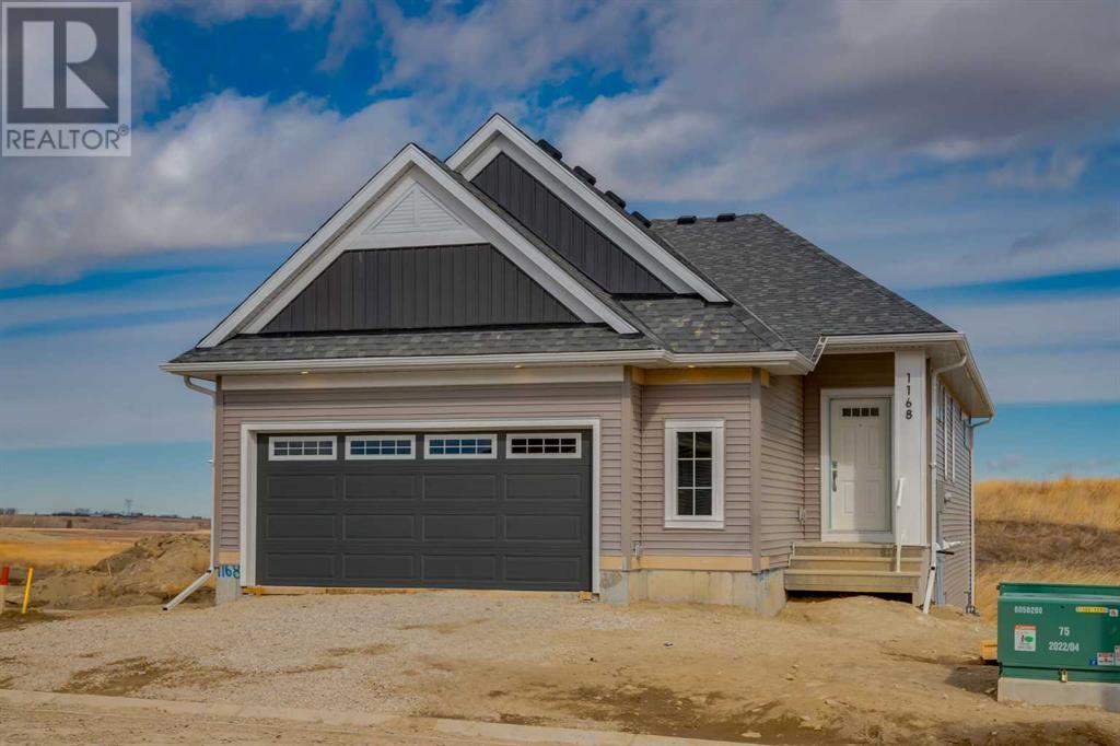 Photo 1 of 1168 Iron Ridge Avenue, Crossfield AB