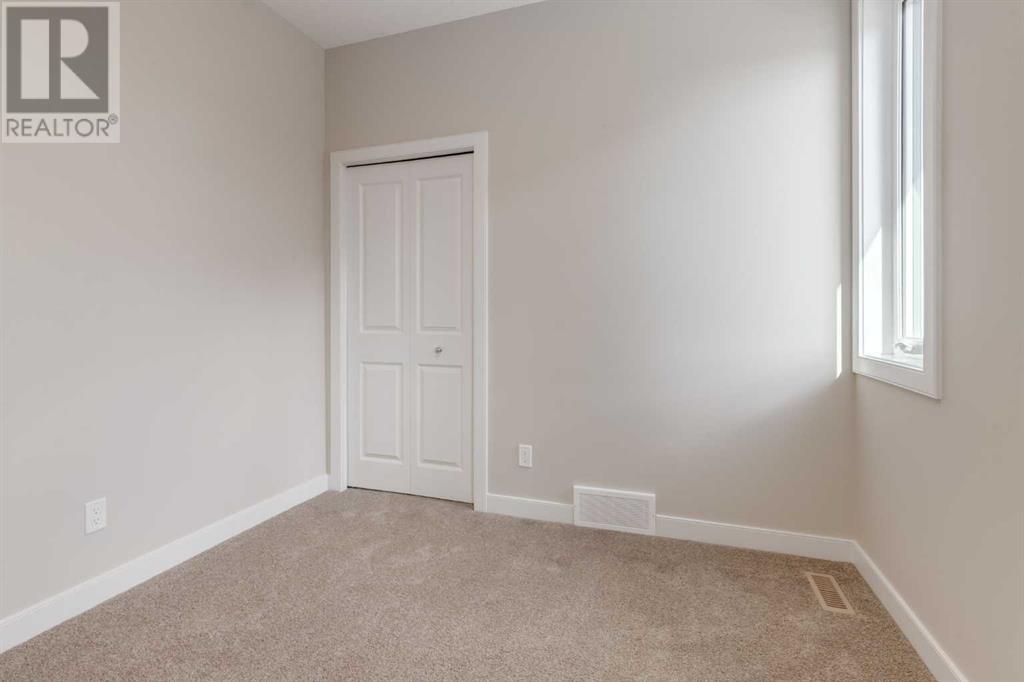 Photo 32 of 1168 Iron Ridge Avenue, Crossfield AB
