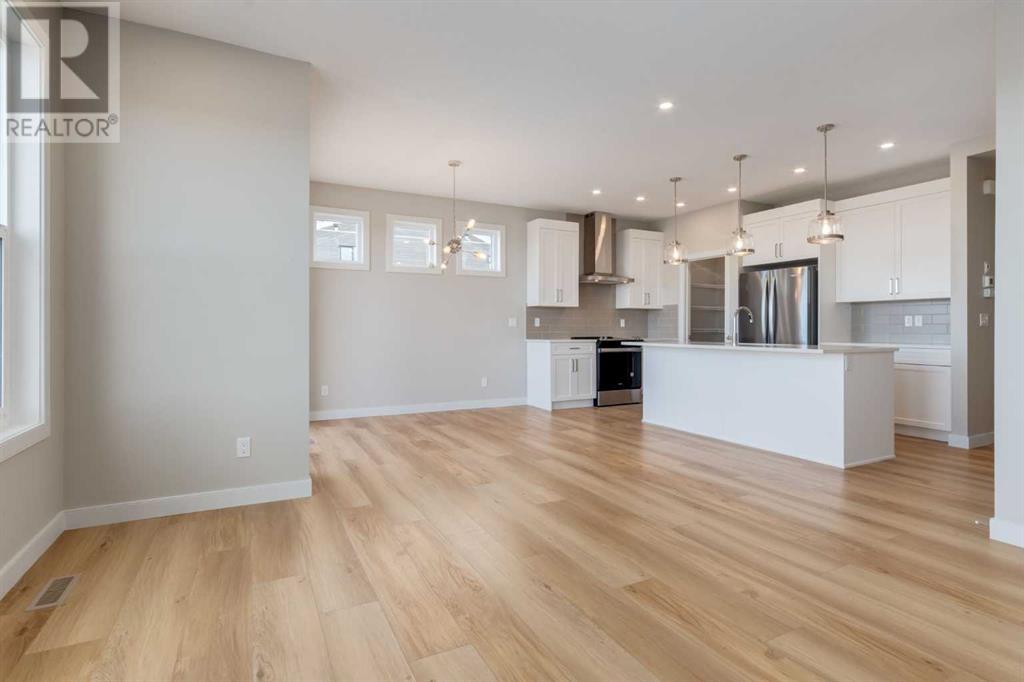 Photo 16 of 1168 Iron Ridge Avenue, Crossfield AB