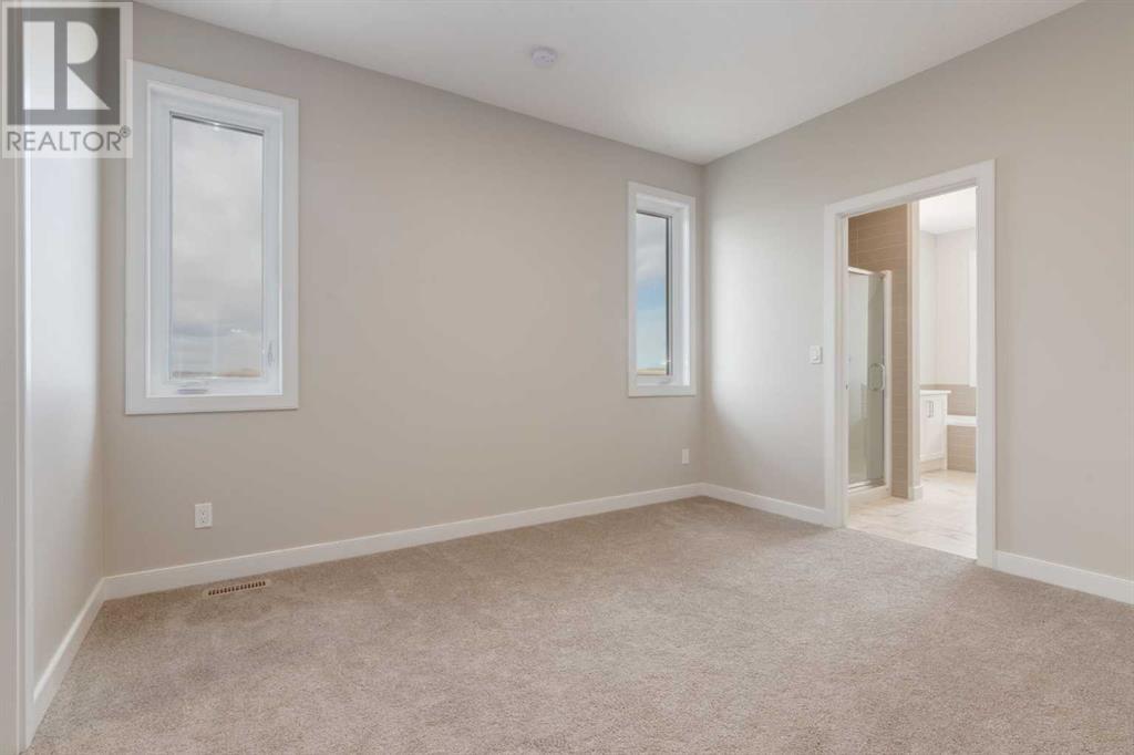 Photo 22 of 1168 Iron Ridge Avenue, Crossfield AB