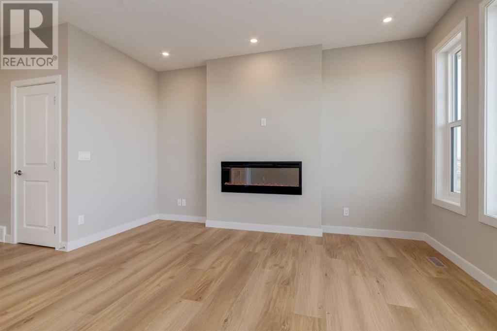 Photo 18 of 1168 Iron Ridge Avenue, Crossfield AB