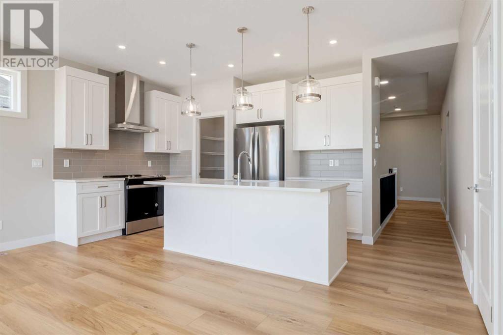 Photo 4 of 1168 Iron Ridge Avenue, Crossfield AB