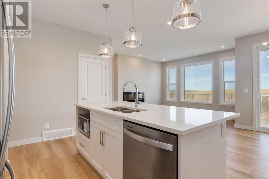 Photo 9 of 1168 Iron Ridge Avenue, Crossfield AB