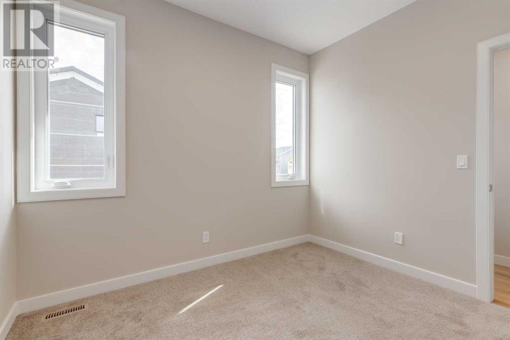 Photo 31 of 1168 Iron Ridge Avenue, Crossfield AB
