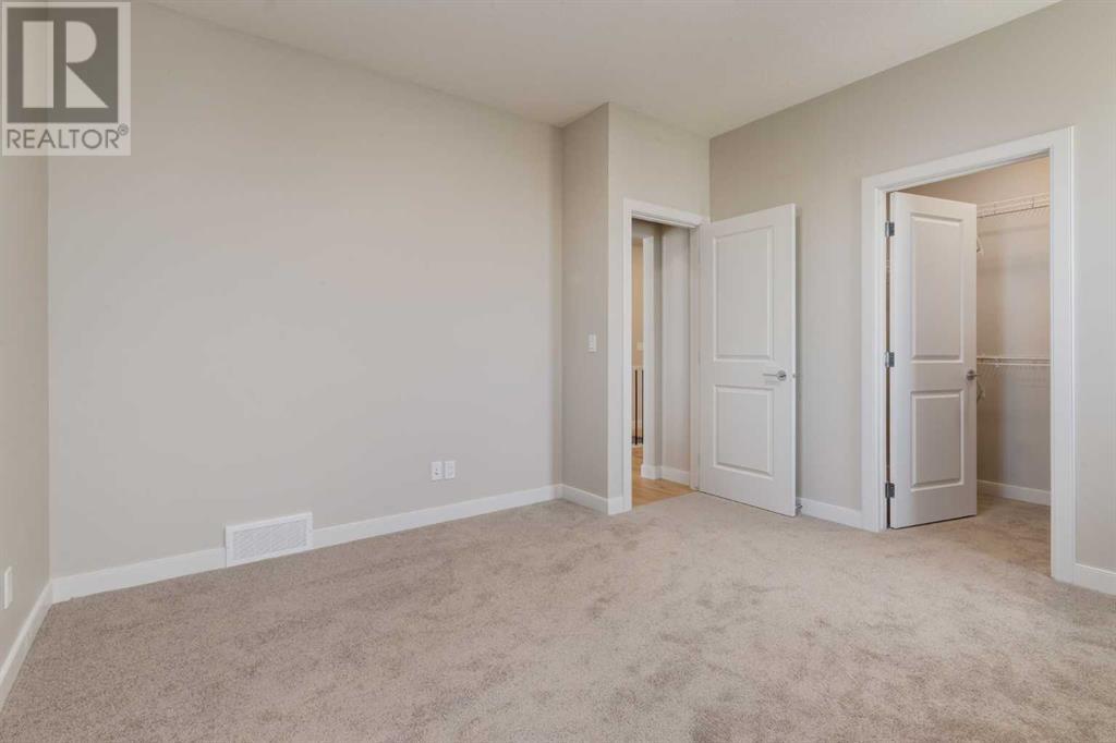 Photo 25 of 1168 Iron Ridge Avenue, Crossfield AB