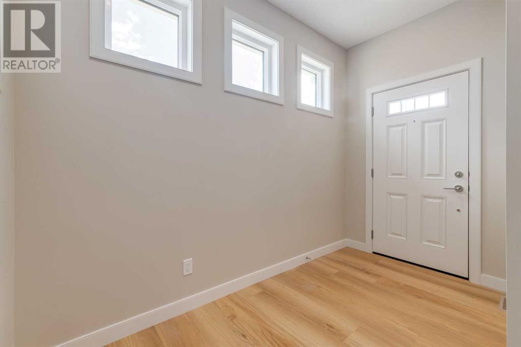 Photo 3 of 1168 Iron Ridge Avenue, Crossfield AB