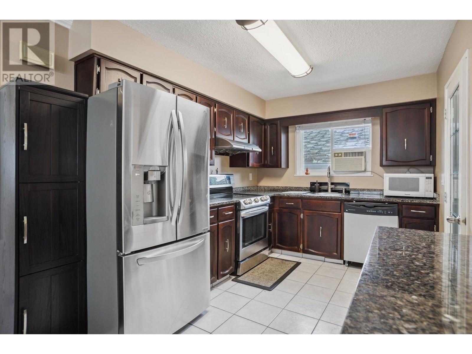 Photo 13 of 4975 Moss Street, Vancouver BC