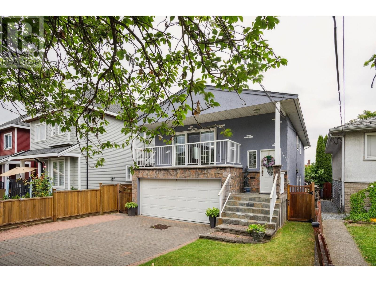 Photo 2 of 4975 Moss Street, Vancouver BC