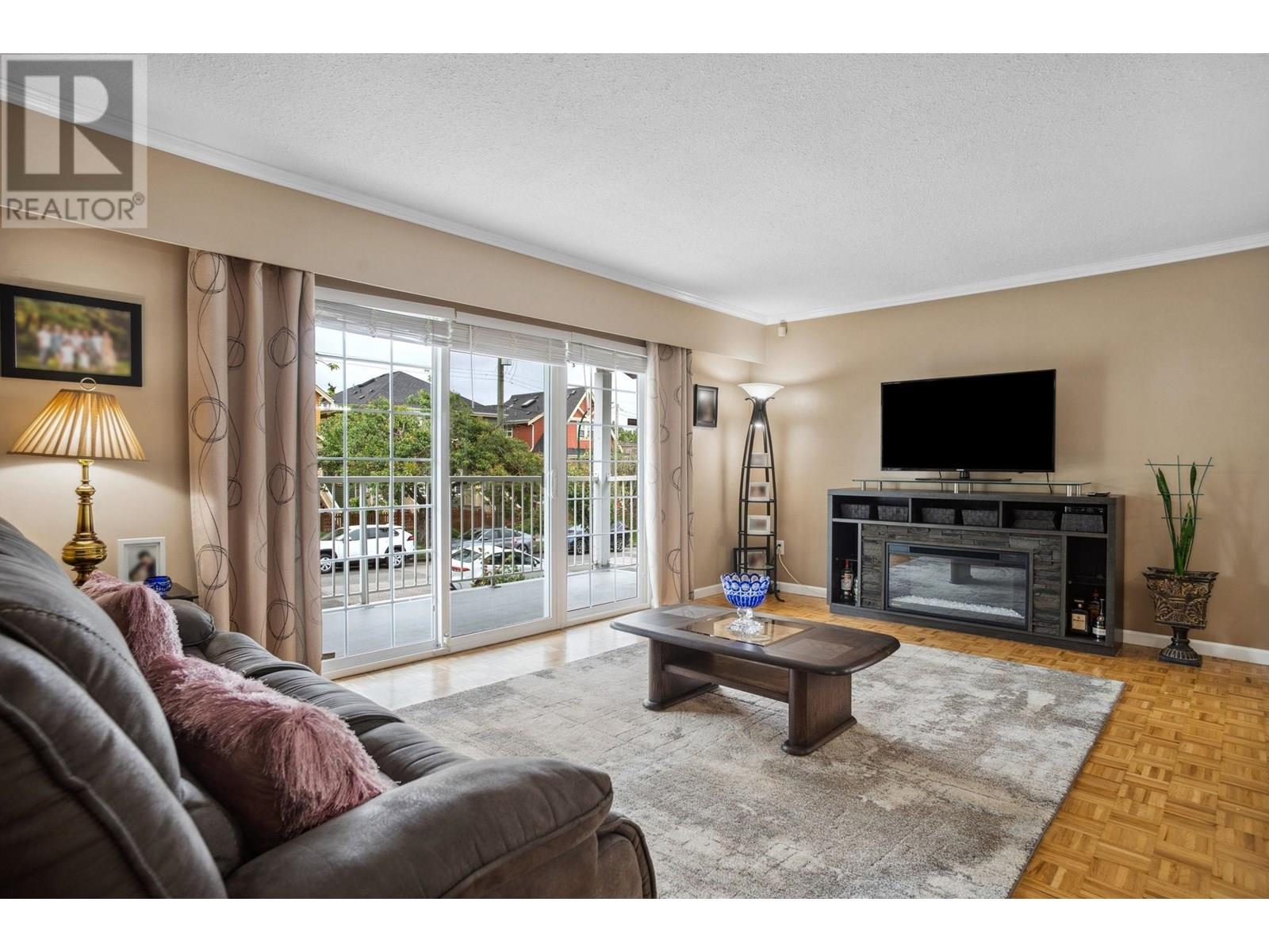 Photo 3 of 4975 Moss Street, Vancouver BC