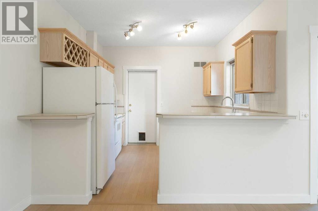 Single Family House for Sale in   Sirocco Drive Signal Hill Calgary 