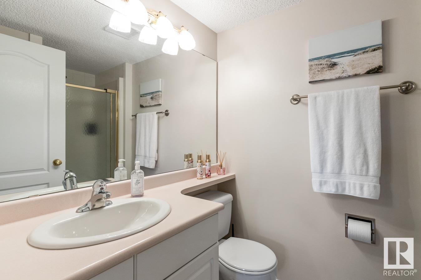 Photo 13 of 202 4906 47 Av, Leduc AB