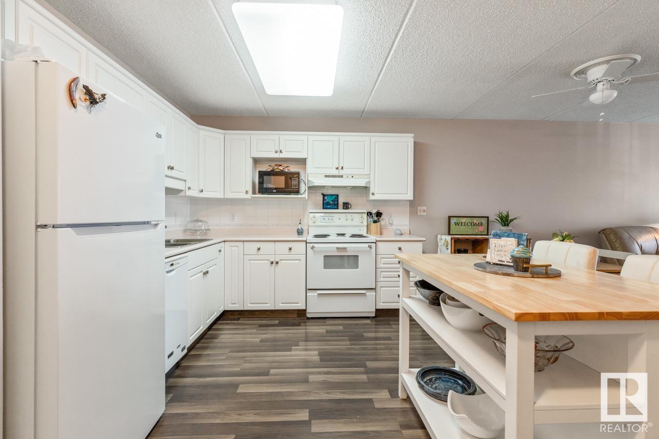 Photo 6 of 202 4906 47 Av, Leduc AB